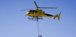 Helicóptero del 112 en labores contra incendios forestales en 2021